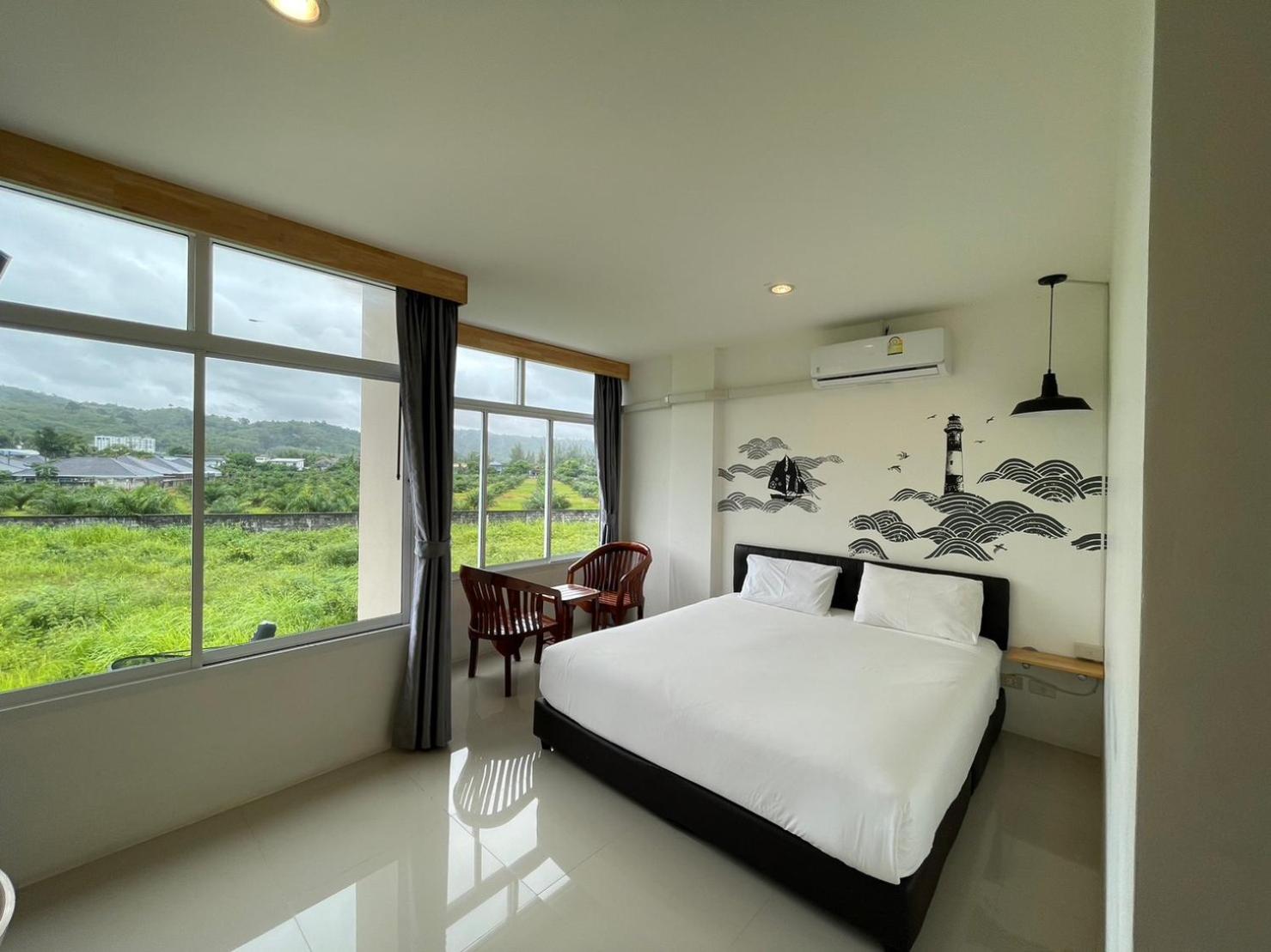 Dwell Phuket Airport Hotel At Naiyang Nai Yang Beach Esterno foto