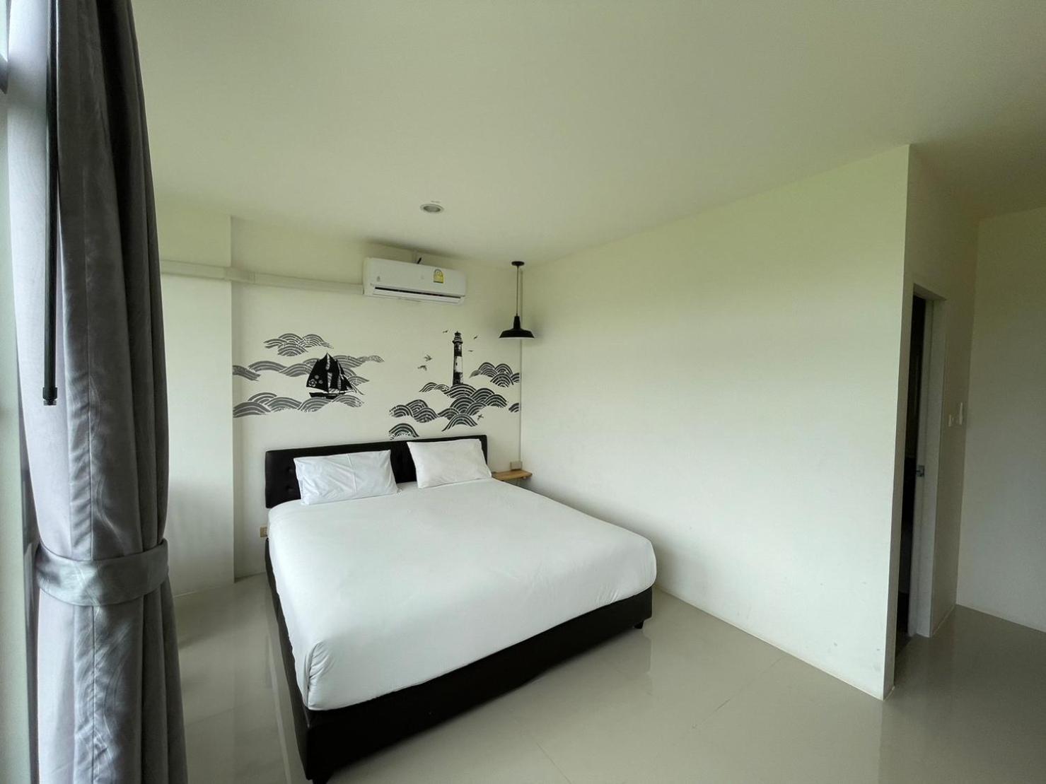 Dwell Phuket Airport Hotel At Naiyang Nai Yang Beach Esterno foto