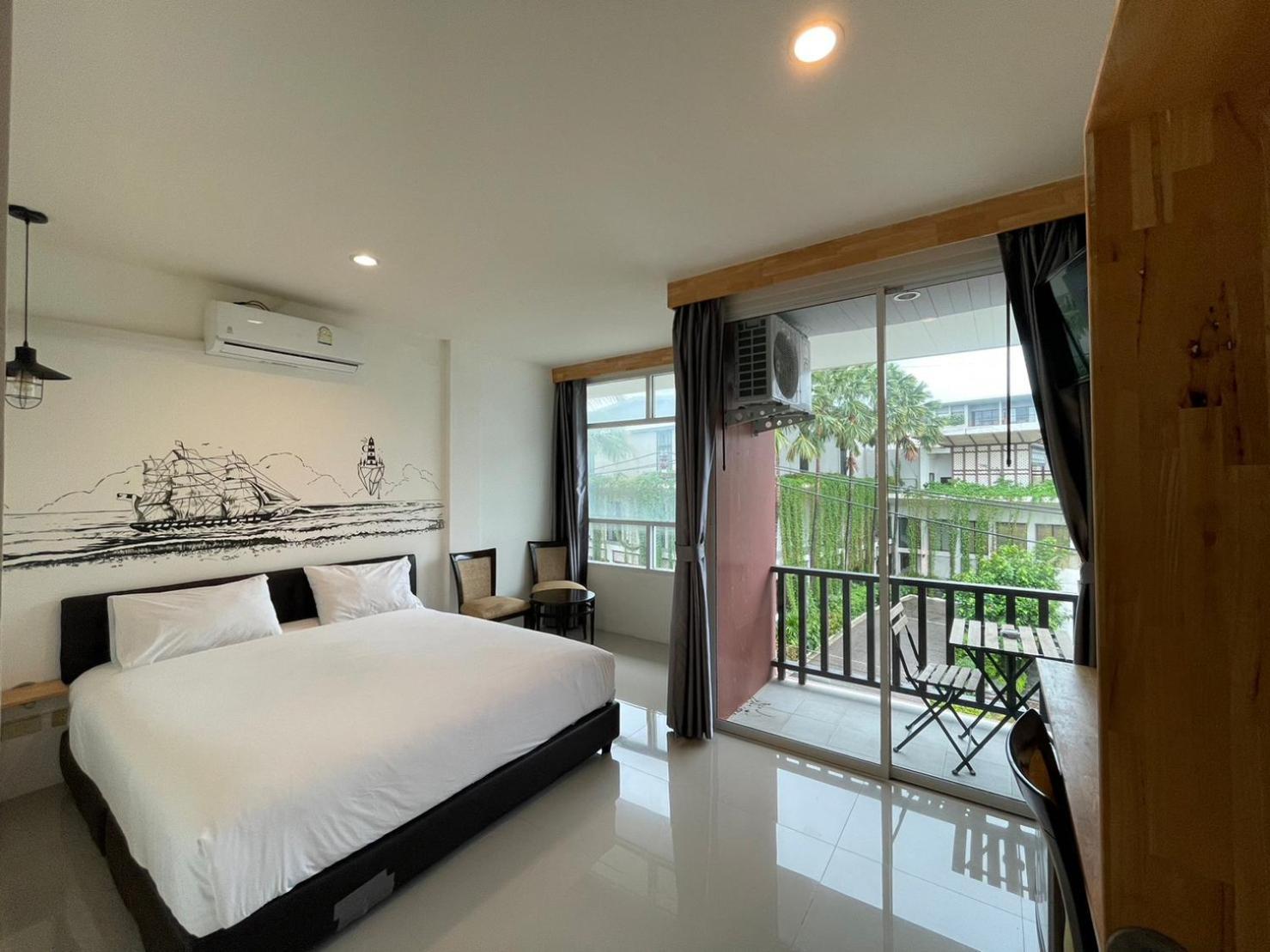 Dwell Phuket Airport Hotel At Naiyang Nai Yang Beach Esterno foto